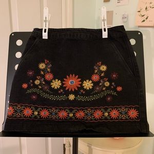 Embroidered black skirt with flowers